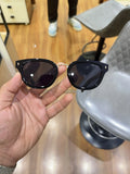 Prada Gold Black Sunglasses - Temple Logo View