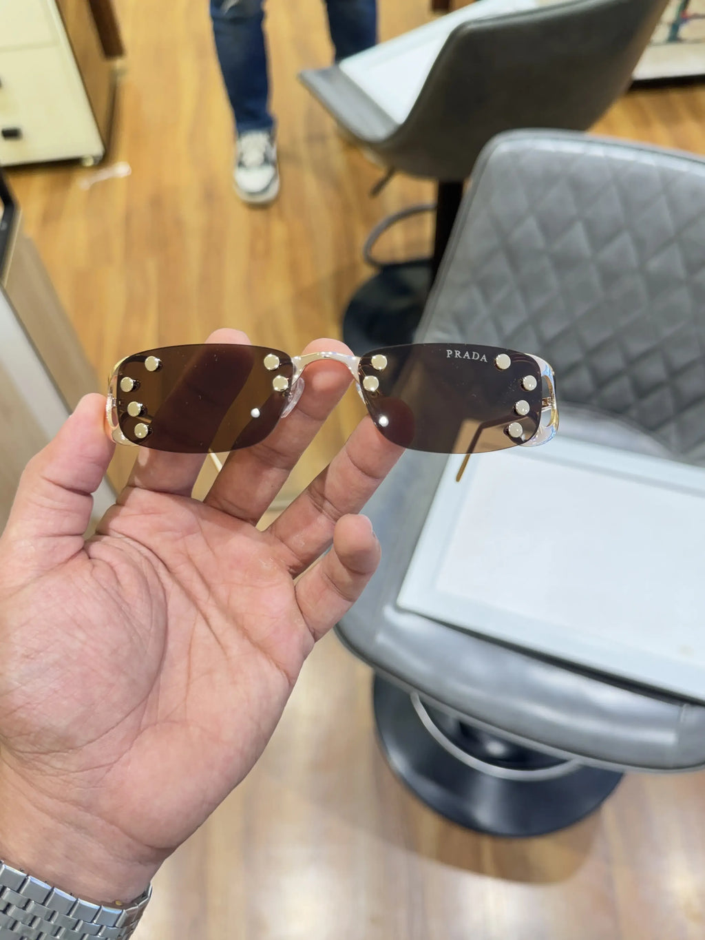 Prada Luxe Rimless Sunglasses Gold Brown - Front View with Studs